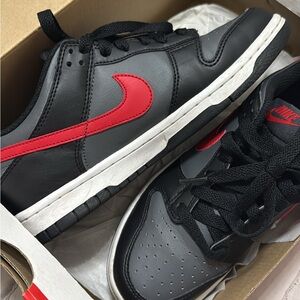 Nike Black Sneakers with Red Swoosh